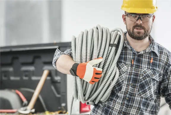 Photo: Man carrying heavy material