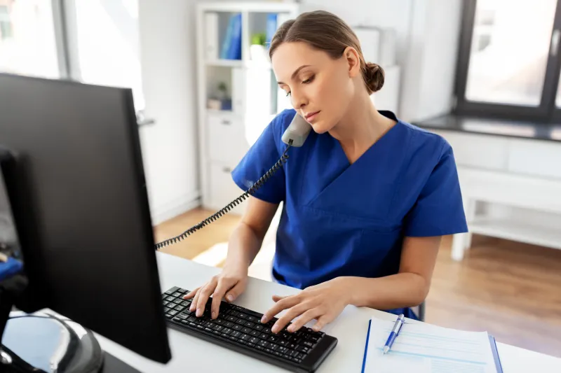 female nurse talking on the phone