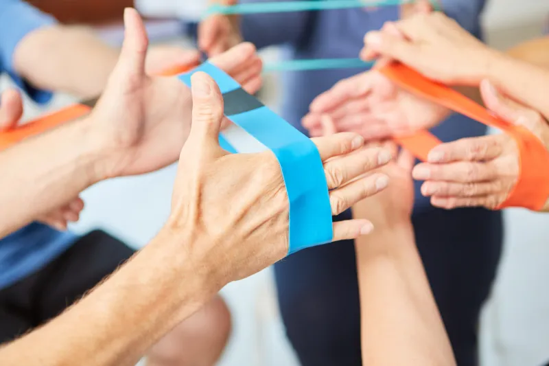 various patients doing hand exercises